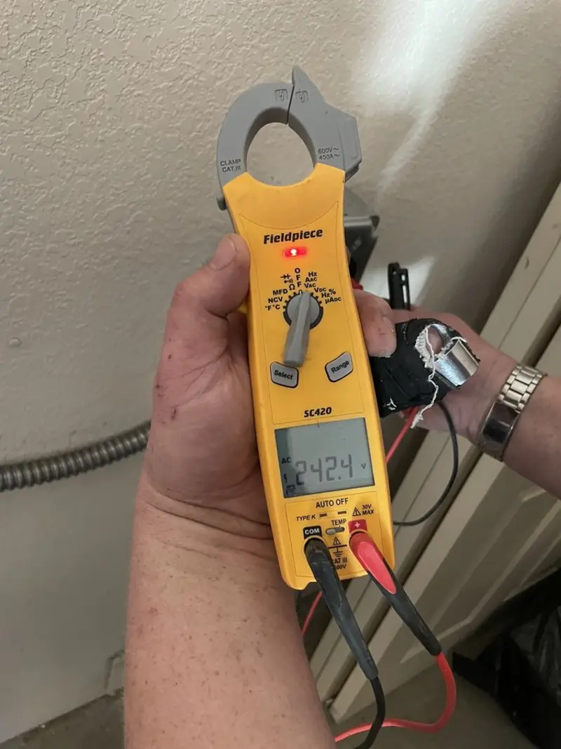 Voltage testing with clamp meter during Ceiling Fan Installation in Belvedere Park